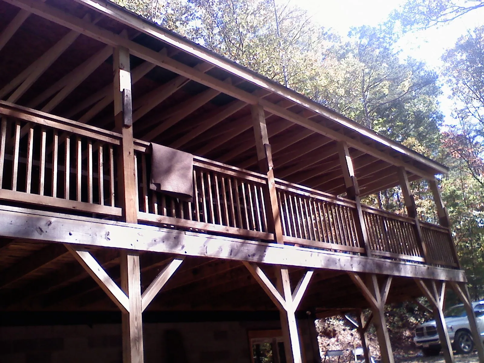 Timber framing under a new elevated porch and deck — Roof Leak Repair in West Greenwich by Roofing Brothers